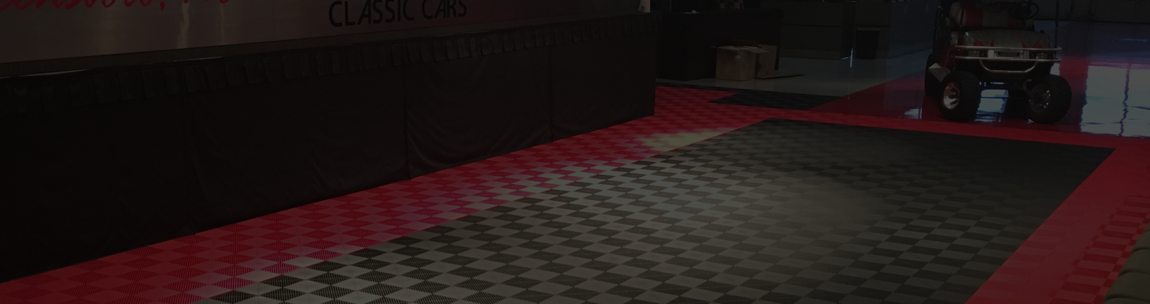 Garage floor with grid tiles